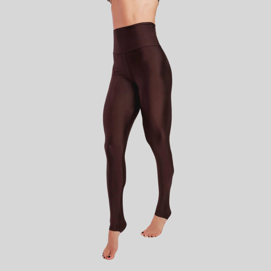 Brown leggings worn by a person on a light gray background
